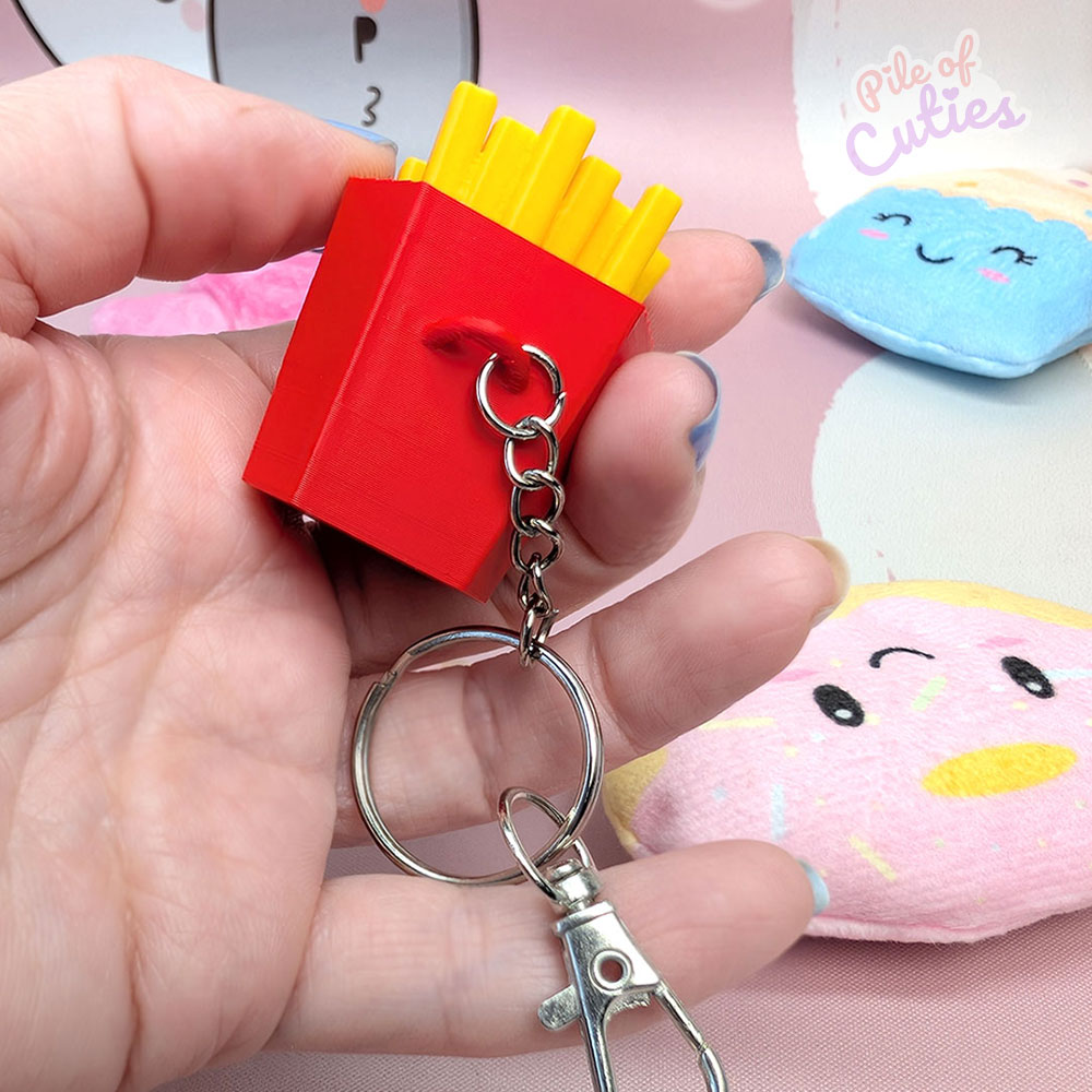 Back side of French fry clicker keychain detail texture