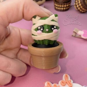 Mummy Cactus Cat Clicker Held in Hand